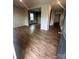 The living room features an open space and wood-look floors at 184 Cherry Birch St, Mooresville, NC 28117