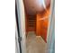 Walk-in closet with custom built-in shelving and orange walls at 184 Cherry Birch St, Mooresville, NC 28117