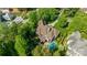 Breathtaking aerial view showcasing the property's expansive grounds, mature trees, and serene outdoor spaces at 18843 Flat Shoals Dr, Cornelius, NC 28031