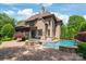 Beautiful backyard with a pool, spa, and patio, ideal for outdoor living and entertaining at 18843 Flat Shoals Dr, Cornelius, NC 28031