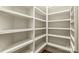 Walk-in pantry provides ample shelving for storage and organization of food items and kitchen essentials at 18843 Flat Shoals Dr, Cornelius, NC 28031