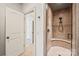 Beautiful tiled shower with a built-in seat, offering a luxurious showering experience at 18843 Flat Shoals Dr, Cornelius, NC 28031