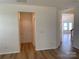 Bright entryway with wood flooring and easy access to the rest of the home at 2018 Rockycreek Ln, Monroe, NC 28112
