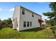 View of the back side of the house, which has vinyl siding at 2018 Rockycreek Ln, Monroe, NC 28112