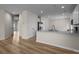 Bright, open kitchen features modern appliances, granite countertops, and breakfast bar at 2018 Rockycreek Ln, Monroe, NC 28112