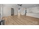 Spacious living room features an open concept and modern flooring with lots of natural light at 2018 Rockycreek Ln, Monroe, NC 28112