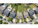 Aerial view showcases homes with well-maintained lawns, landscaping, and outdoor living spaces at 214 Blossom Ridge Dr, Mooresville, NC 28117
