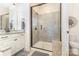 Bathroom featuring a glass-enclosed shower and modern vanity at 214 Blossom Ridge Dr, Mooresville, NC 28117