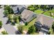 Aerial view of home with well-maintained lawn and landscaping, and paved driveway in a suburban neighborhood at 214 Blossom Ridge Dr, Mooresville, NC 28117