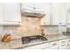 Well-equipped kitchen with granite countertops, stainless steel appliances, and gas cooktop at 214 Blossom Ridge Dr, Mooresville, NC 28117
