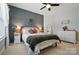 Bedroom with a decorative wall, a ceiling fan and natural light from the window at 220 Forsythia Ln, Tega Cay, SC 29708