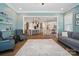 Open-concept living room with views of the dining area and kitchen, perfect for entertaining at 220 Forsythia Ln, Tega Cay, SC 29708