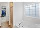 Bathroom features walk in shower and soaking tub at 2306 Nettleton Ct, Matthews, NC 28105
