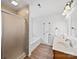 Bathroom features walk in shower, soaking tub, and double sinks at 2306 Nettleton Ct, Matthews, NC 28105