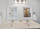 Bathroom features double sinks, framed mirrors and great lighting at 2306 Nettleton Ct, Matthews, NC 28105