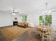 Bright living room featuring fireplace and access to the outdoor deck through sliding glass doors at 2306 Nettleton Ct, Matthews, NC 28105