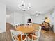 Cozy living area featuring a dining table and a fireplace, ideal for gatherings at 2306 Nettleton Ct, Matthews, NC 28105