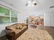 Cozy living room with an open layout, connecting dining and kitchen areas at 2306 Nettleton Ct, Matthews, NC 28105