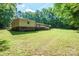 Sprawling backyard with a spacious deck, perfect for outdoor living at 2310 Alexis Lucia Rd, Stanley, NC 28164