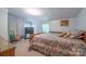 Bedroom with large bed and exterior access at 2310 Alexis Lucia Rd, Stanley, NC 28164