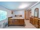 This bedroom features a large bed, dresser and carpeted floors at 2310 Alexis Lucia Rd, Stanley, NC 28164