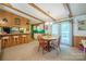 Dining area adjacent to a breakfast bar and kitchen, providing a cozy space for meals and entertaining at 2310 Alexis Lucia Rd, Stanley, NC 28164
