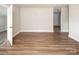 Bright and airy living room with wood floors at 2409 Thornton Rd, Charlotte, NC 28208