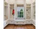 Mud room features built-in storage, bench seating, and a window at 2410 Vernon Dr, Charlotte, NC 28211