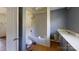 Bathroom with a tub, toilet, vanity, and sink at 2645 Kool Park Ne Rd, Hickory, NC 28601