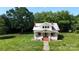 Classic home featuring a covered porch, spacious yard, and a traditional two-story design at 2645 Kool Park Ne Rd, Hickory, NC 28601