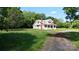 Charming two-story home with a cozy front porch and a large, grassy front yard at 2645 Kool Park Ne Rd, Hickory, NC 28601