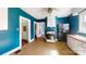 A cozy kitchen featuring wood floors, a vintage stove, and a classic refrigerator at 2645 Kool Park Ne Rd, Hickory, NC 28601