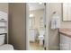 Comfortable bathroom featuring tile floors, a toilet, vanity sink, and ample lighting at 2750 Victory Ct, Fort Mill, SC 29715