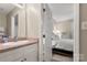 Bathroom with a vanity sink, granite counters and a view to the bedroom at 2750 Victory Ct, Fort Mill, SC 29715