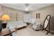 Bedroom featuring a futon, office area and natural light from a sunny window at 2750 Victory Ct, Fort Mill, SC 29715
