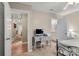 Bedroom featuring a writing desk and en-suite bathroom with neutral color walls at 2750 Victory Ct, Fort Mill, SC 29715