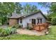 Charming exterior with a backyard deck, and low maintenance gravel landscaping with various foliage at 2750 Victory Ct, Fort Mill, SC 29715