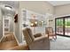 Comfortable living room boasts a recliner, vaulted ceiling, and sliding door access to the deck at 2750 Victory Ct, Fort Mill, SC 29715