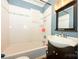 Bright bathroom featuring a bathtub, subway tile surround, and a classic vanity at 2905 Grimes St, Charlotte, NC 28206