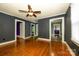 Spacious living room showcasing hardwood floors and access to multiple rooms at 2905 Grimes St, Charlotte, NC 28206