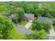 Overhead view of the house with lush trees, surrounding neighborhood and charming curb appeal in a desirable area at 2907 Notchview Ct, Charlotte, NC 28210
