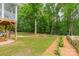 Expansive backyard featuring lush green grass and privacy fence perfect for Gathering gatherings and outdoor recreation at 2907 Notchview Ct, Charlotte, NC 28210