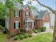 Beautiful brick home with manicured landscaping and an attached two-car garage at 2907 Notchview Ct, Charlotte, NC 28210