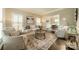 Cozy living room with neutral furniture and hardwood floors at 2907 Notchview Ct, Charlotte, NC 28210