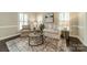 Cozy living room with neutral furniture and hardwood floors at 2907 Notchview Ct, Charlotte, NC 28210
