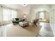 Bright bonus room with a large rug, couch, and chair at 2907 Notchview Ct, Charlotte, NC 28210