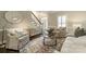 Cozy living room with stairs, decor, and hardwood floors at 2907 Notchview Ct, Charlotte, NC 28210