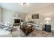 Cozy living room featuring a fireplace and comfortable seating at 2907 Notchview Ct, Charlotte, NC 28210