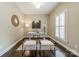 Bright office with desk, art, and plantation shutters at 2907 Notchview Ct, Charlotte, NC 28210