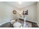 Bright office with desk, art, and plantation shutters at 2907 Notchview Ct, Charlotte, NC 28210